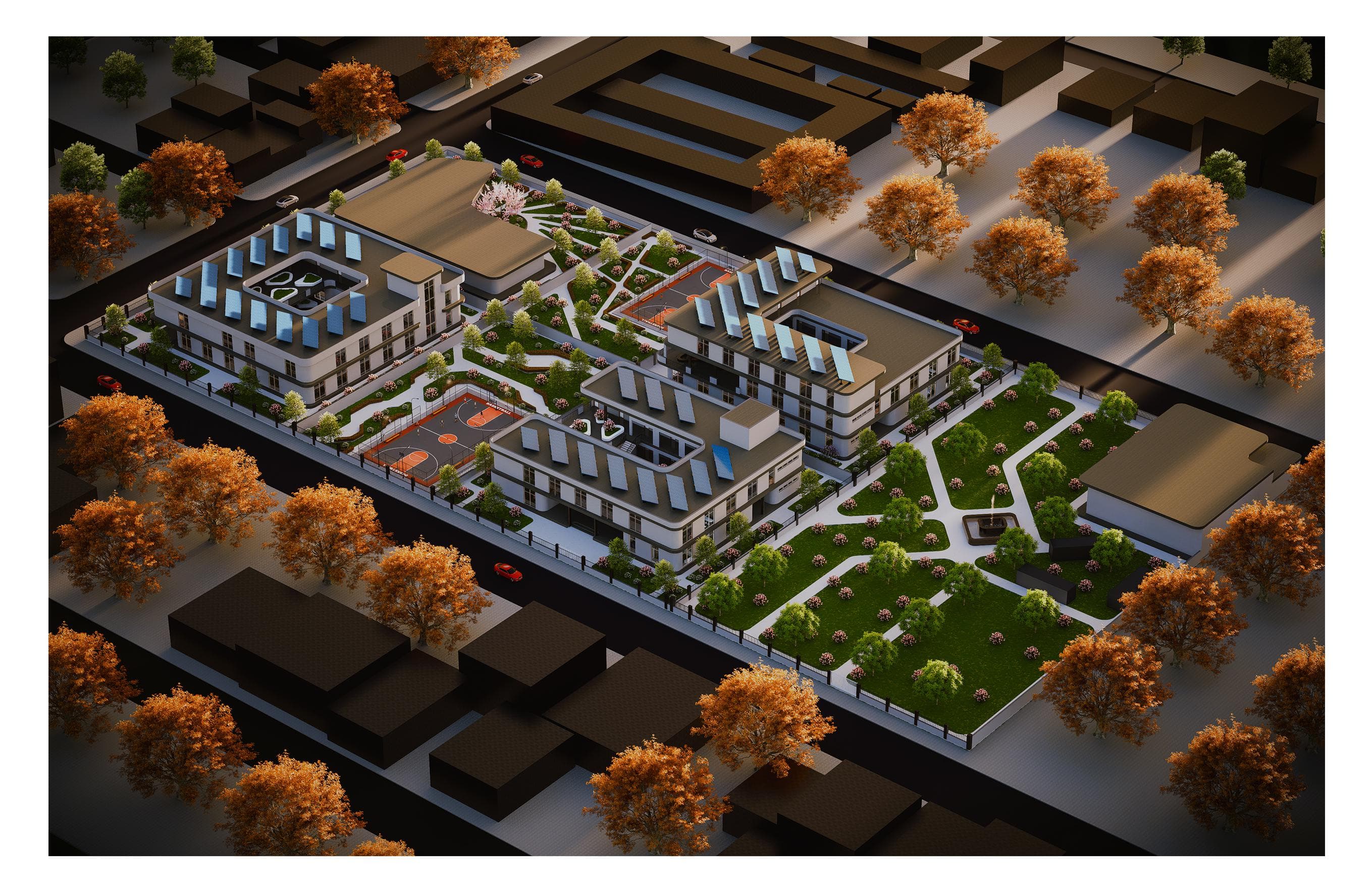 A second aerial view highlights the balance between buildings and landscape. Two principal volumes frame a generous park, giving classrooms long views and creating a green heart for daily campus life.