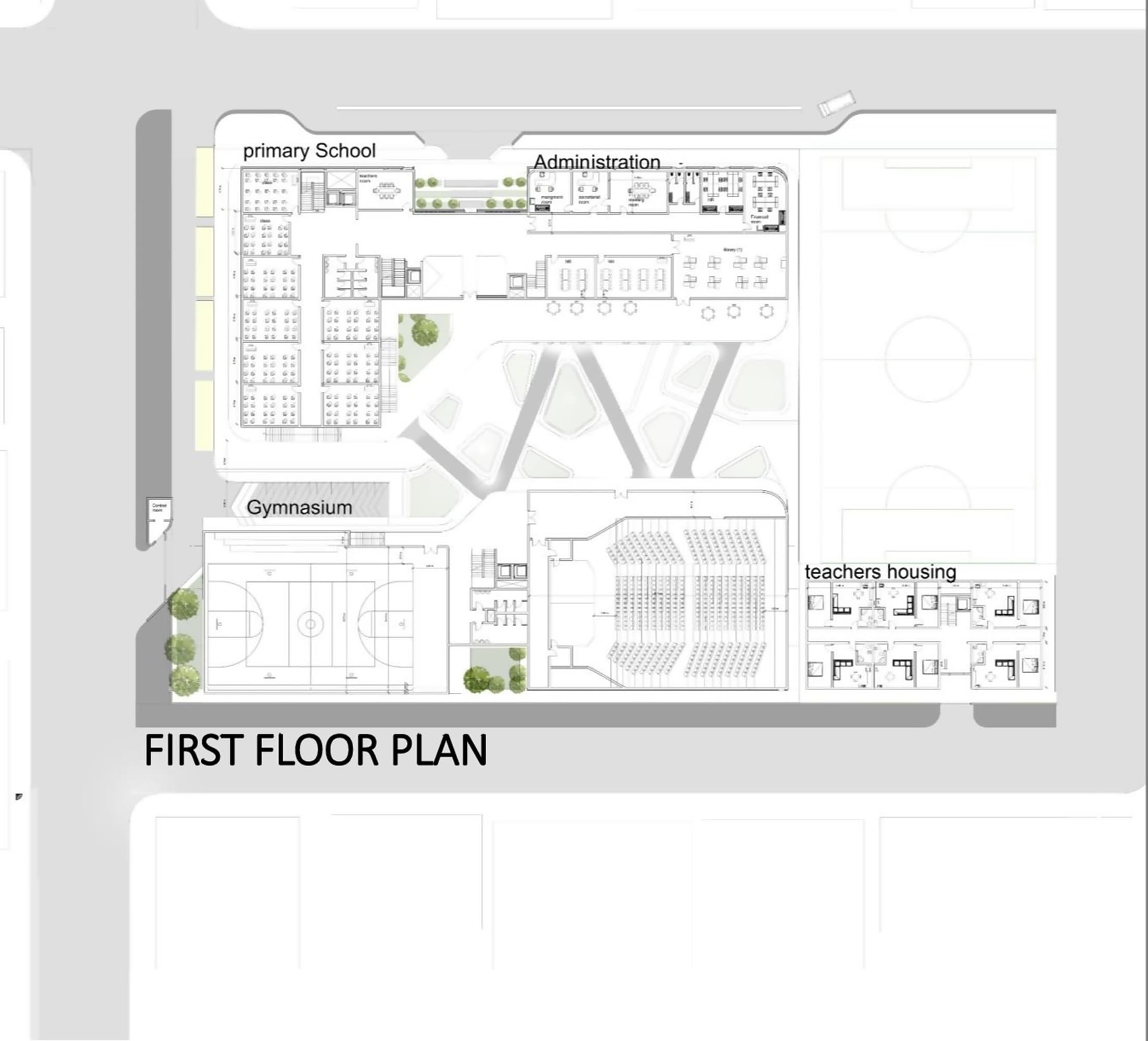 On the first floor, the program expands with administration offices, a theater, and a gymnasium. These functions maintain visual links to the courtyard, reinforcing the sense of openness and community across different levels.
